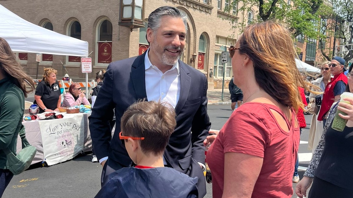 The candidate for the Republican Gubernatorial Bill Spadea talks to the voters at a street fair in Somerville, New Jersey, on June 1, 2025.